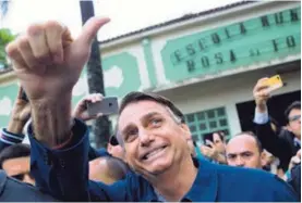  ?? AFP ?? Bolsanaro estuvo cerca, pero no le alcanzó. Va de nuevo el 28 de octubre.