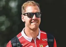  ?? Virendra Saklani/Gulf News ?? Sebastian Vettel of Scuderia Ferrari team before the first practice session of 2017 Formula 1 Ethiad Airways Abu Dhabi Grand Prix yesterday. He had a good afternoon practice session.