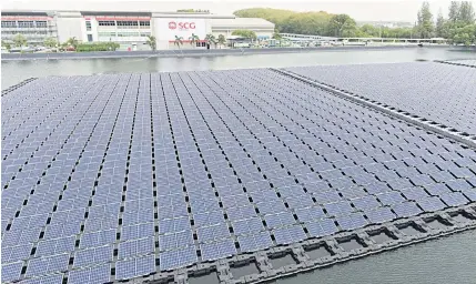  ??  ?? A floating solar farm at a pond at SCG Chemicals’ plant in Rayong’s Map Ta Phut Industrial Estate.