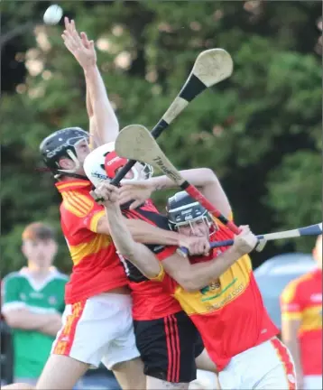  ??  ?? A tussle in mid-air from Friday’s Permanent TSB Junior hurling championsh­ip clash in Clongeen.