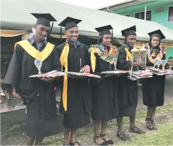  ?? Photo: Losirene Lacanivalu. ?? Year 13 award recipients of Lami High School with their prizes and awards on November 8, 2017.