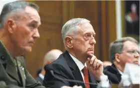  ?? Alex Brandon / Associated Press ?? Defense Secretary Jim Mattis (center) had sought authority to start a new round of military base closings in 2021, but lawmakers rejected the request.