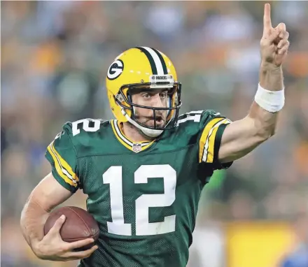  ?? NETWORK-WISCONSIN DAN POWERS/USA TODAY ?? Packers quarterbac­k Aaron Rodgers could get a rich contract extension this off-season.