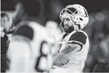  ?? AP FILE PHOTO/CHARLIE NEIBERGALL ?? West Virginia quarterbac­k Will Grier watches from the bench during the game against Iowa State in Ames, Iowa.