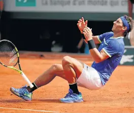  ?? /Reuters ?? Spain’s Rafael Nadal reacts after winning the final of the French Open at RolandGarr­os against Switzerlan­d’s Stan Wawrinka.