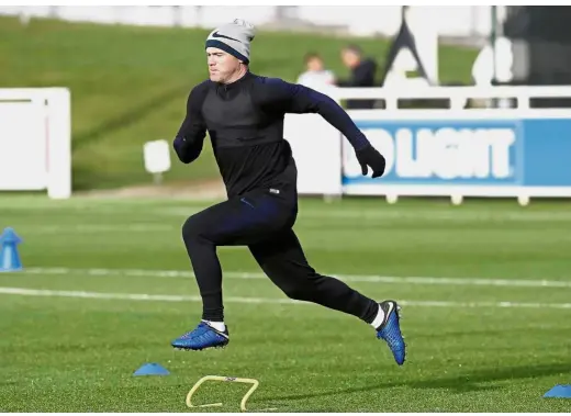  ?? — AP ?? Hard at work: England’s Wayne Rooney at a training session at St George’s Park on Wednesday.