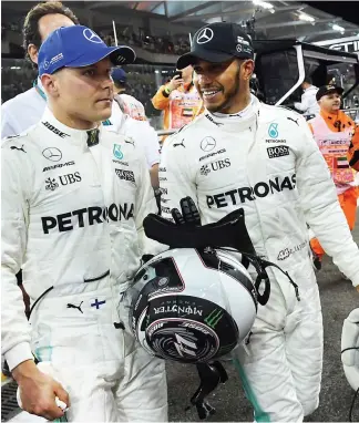  ?? PHOTO AFP ?? Valtteri Bottas (à gauche) tentera de remporter son premier succès aux Émirats arabes unis aujourd’hui. Son coéquipier, Lewis Hamilton en a déjà trois.