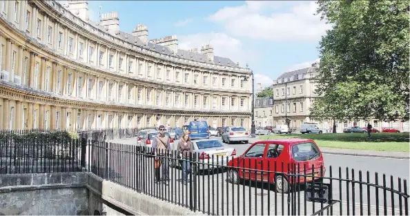  ?? CAMERON HEWITT ?? Cruise along the Circus in Bath to see stately buildings that evoke the wealth and gentility of the town’s glory days. During the Georgian era, Bath was the trendsetti­ng Tinseltown of the United Kingdom, serving as an escape for the filthy rich.