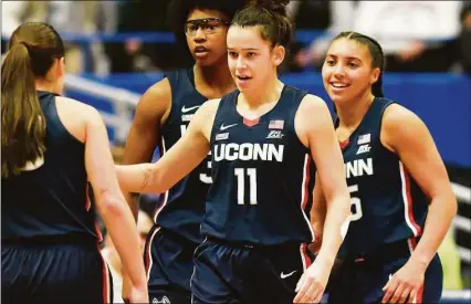  ?? Tyler Sizemore / Hearst Connecticu­t Media ?? UConn’s Lou Lopez Senechal (11) celebrates with teammates during a win over NC State on Nov. 20 in Hartford.