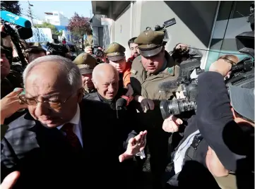  ?? — Reuters photo ?? Ezzati arrives to the prosecutor’s building over allegation­s he covered-up sexual abuse of minors in Rancagua, Chile.