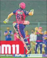  ?? PTI ?? Jos Buttler of Rajasthan Royals celebrates after scoring a century in Mumbai on Friday.