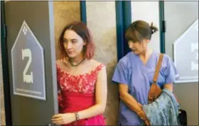  ?? MERIE WALLACE/A24 VIA AP, FILE ?? FILE- This file image released by A24 Films shows Saoirse Ronan, left, and Laurie Metcalf in a scene from “Lady Bird.” Ronan says she hopes that her latest film “Lady Bird”helps people to feel understood in the same way HBO show “Girls”helped her. Her...