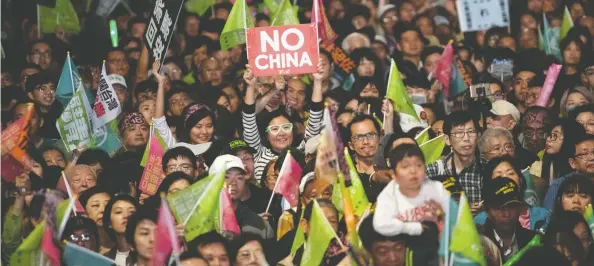  ?? CARL COURT / GETTY IMAGES ?? Taiwan's first female president, Tsai Ing-wen, is fiercely anti-China and obviously popular on the island considerin­g she was re-elected in a landslide last year.