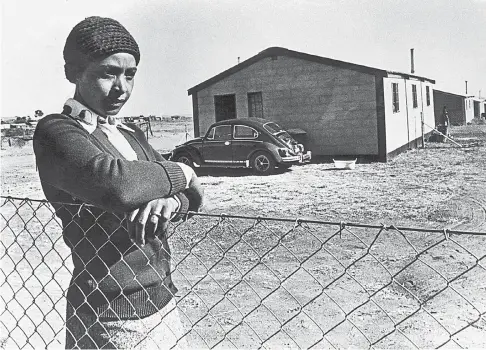  ?? Picture: Peter Magubane/Avusa Archives/Gallo Images/Getty Images ?? ISOLATION Winnie Madikizela- Mandela at her home in Brandfort, Free State, where she spent almost nine years after being banished there in 1977.