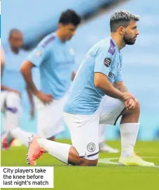  ??  ?? City players take the knee before last night’s match