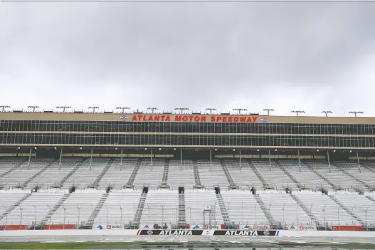  ?? CHRIS GRAYTHEN/GETTY IMAGES ?? NASCAR has postponed Sunday’s race at the Atlanta Motor Speedway due to the coronaviru­s pandemic. All Indycar races through April are cancelled.