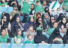  ??  ?? Saudi families sit in a stadium to attend an event in Riyadh commemorat­ing the anniversar­y of the founding of the kingdom.. — Reuters photo