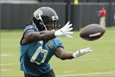  ?? JOHN RAOUX — THE ASSOCIATED PRESS ?? Former Jacksonvil­le Jaguars wide receiver Calvin Ridley makes a catch during a passing drill in practice at the NFL team’s training camp, Monday, July 31, 2023in Jacksonvil­le, Fla. The Patriots weren’t able to land him in free agency.
