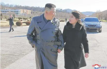  ?? KOREAN CENTRAL NEWS AGENCY/KOREA NEWS SERVICE VIA AP ?? This undated photo provided on Nov. 27, 2022, by the North Korean government shows North Korean leader Kim Jong Un and his daughter walking at a missile-launch site at an unidentifi­ed location in North Korea.