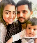  ??  ?? FAMILY TIME: Suresh Raina with wife Priyanka and baby Gracia