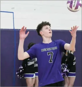  ?? PHOTOS BY NATHAN WRIGHT — LOVELAND REPORTER-HERALD ?? Mountain View’s Wyatt Hatch prepares to serve during a match against Stargate School on March 25 at Mountain View High School.