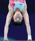  ?? The Canadian Press ?? China’s Quan Hongchan competes in women’s diving at the Summer Games, Thursday, in Tokyo.