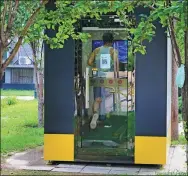  ?? PROVIDED TO CHINA DAILY ?? A man exercises in a compact Misspao gym booth in a residentia­l community in Beijing.