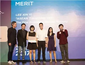  ??  ?? The One Academy students won the Merit award during the Kancil Awards 2017, presented by Kancil Awards creative council chairman Tan Kien Eng (first from left) to group leader Lee Xin Yi (third from left).
