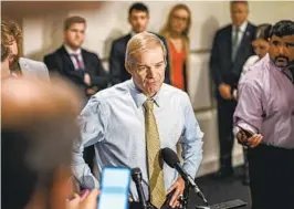  ?? KENNY HOLSTON NYT ?? Rep. Jim Jordan, R-Ohio, speaks to reporters after being denied the role of House speaker following a third round of voting at the Capitol on Friday.