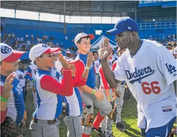  ?? GETTY IMAGES ?? Yassiel Puig visitó Cuba como parte de una delegación de Grandes Ligas que rompió el hielo para restablece­r aproximaci­ones con las autoridade­s cubanas.