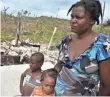  ?? HECTOR RETAMAL, AFP/GETTY IMAGES ?? Hurricane Matthew tore through the commune of Roche-a-Bateaux in southweste­rn Haiti last year.