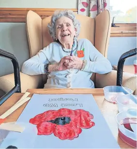  ?? ?? All smiles Resident Mary Sandilands with her Remembranc­e Sunday picture