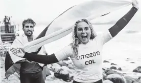  ?? AFP ?? Los hermanos Giorgio e Isabella Gómez festejando por las medallas de oro.