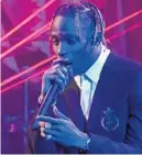  ?? CHRIS PIZZELLO/INVISION ?? Fast food giant McDonald’s has unveiled a marketing partnershi­p with rapper Travis Scott that a majority of franchisee­s opposed, according to the trade website Restaurant Business.