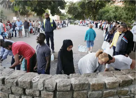 ?? PICTURE: REUTERS ?? SERVICE DELIVERY: Due to various concerns, a new water-collection site has been opened in Newlands, which offers good public access and better facilities, says the writer.