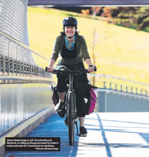  ?? ?? Alison Hetheringt­on, left, from the Bicycle Network, is calling on the government to make it easier and safer for Tasmanians to ride bikes.
Picture: Richard Jupe