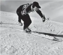  ?? Courtesy of Kurt Miller ?? Warren Miller skis in one of his trademark hats.