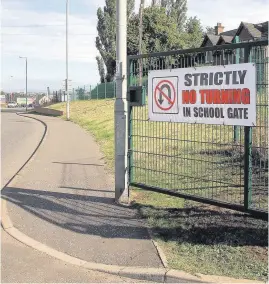  ??  ?? Warning sign Parents say children at St Charles’ Primary are being put in danger by selfish drivers