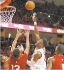  ?? PATRICK SEMANSKY/AP ?? Maryland forward Bruno Fernando shoots over Indiana forward Justin Smith, from left, forward Juwan Morgan and guard Aljami Durham in the second half Friday.