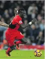  ?? PAUL ELLIS/GETTY IMAGES/FILES ?? The temporary departure of Sadio Mane has weakened Liverpool’s attack.