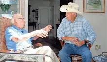  ?? Doug Walker ?? Mike McDougald (left) and Billy Puryear reminisce about the John Wisdom Wagon Train Ride, an event that started in 1979 but will end this October.