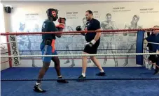  ??  ?? MOVING AROUND: An out-of-shape Fury
[right] spars with an inexperien­ced Dubois