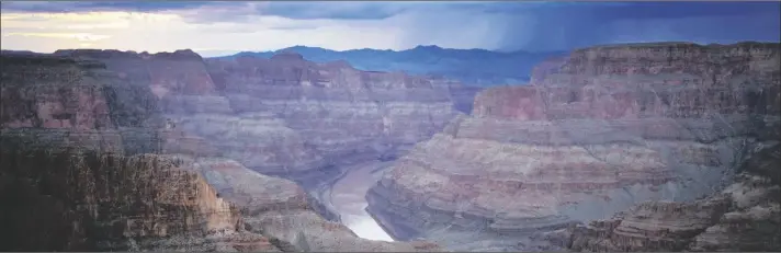  ?? AP PHOTO/JOHN LOCHER ?? The Colorado River flows through the Grand Canyon on the Hualapai reservatio­n on August 15, 2022, in northweste­rn Arizona.