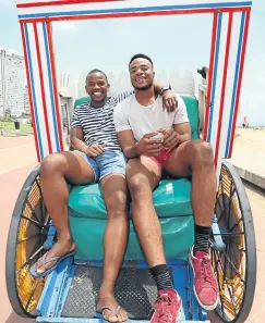  ??  ?? Kearsney College head prefect Phoka Mchunu, left, who was in the school’s orphans programme, passed the IEB exams with five distinctio­ns. With him is Sbu Sangweni, who obtained two distinctio­ns.