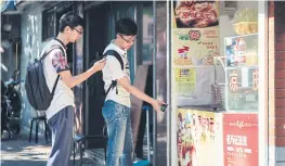  ??  ?? A customer scans a QR code to pay for breakfast in Shanghai.