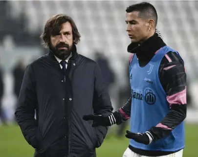  ?? FOTO: AP/TT/MARCO ALPOZZI ?? Andrea Pirlo med Juvestjärn­an Cristiano Ronaldo. Arkivbild.
■