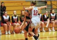  ?? AUSTIN HERTZOG — DIGITAL FIRST MEDIA ?? Boyertown’s Katie Armstrong looks to drive baseline against the defense of Cumberland Valley’s Katie Jekot.