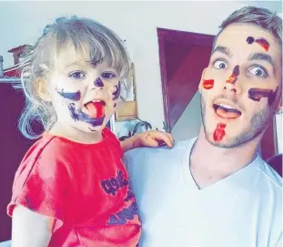  ?? KAREN BEER/SPECIAL TO THE GUARDIAN ?? Cameron Gray is shown having fun face-painting with his daughter, Mia. Mia is now three years old.