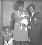  ?? COURTESY OF JAMES E. CAUSEY ?? Otha R. Causey, center, and her husband, James D. Causey, pose for a photo on the first birthday of their son James E. Causey on Aug. 1, 1970. Also pictured is their nephew, Chris McKnight.