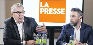  ?? PAUL CHIASSON/THE CANADIAN PRESS ?? La Presse publisher Guy Crevier, left, along with president Pierre-Elliott Levasseur, is moving the Quebec publicatio­n to a not-for-profit structure.